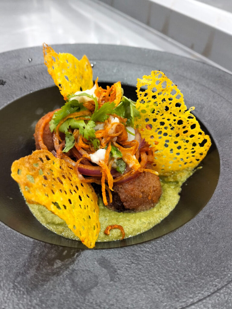 Kebabs with mint chutney and a papad crisp