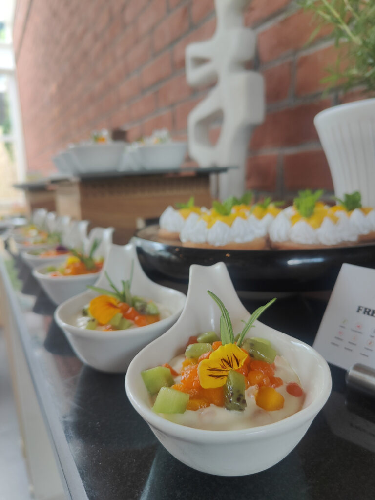 Buffet dessert display of verrines and mango tarts
